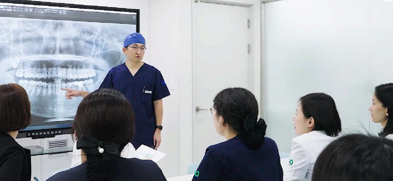 BOA specialist explaining a treatment plan to the clinical team